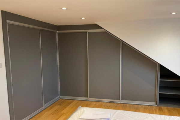dark grey sliding angled wardrobe