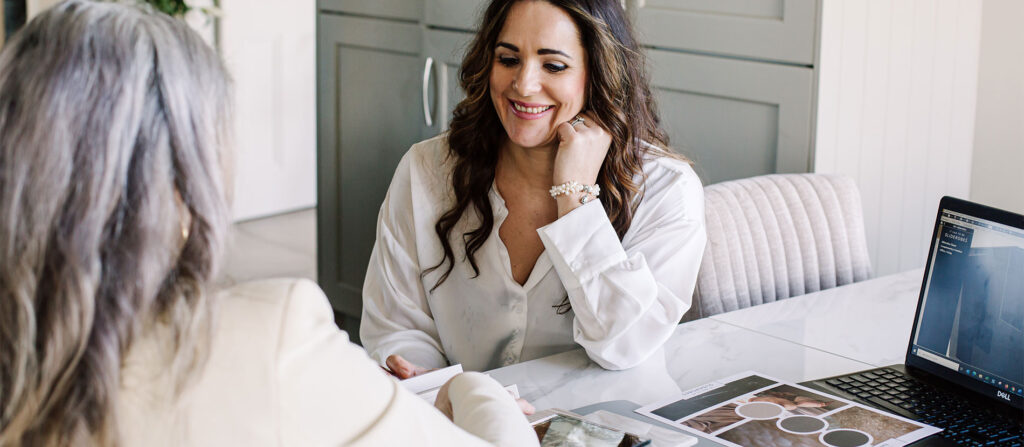 designer with customer at a home design appointment