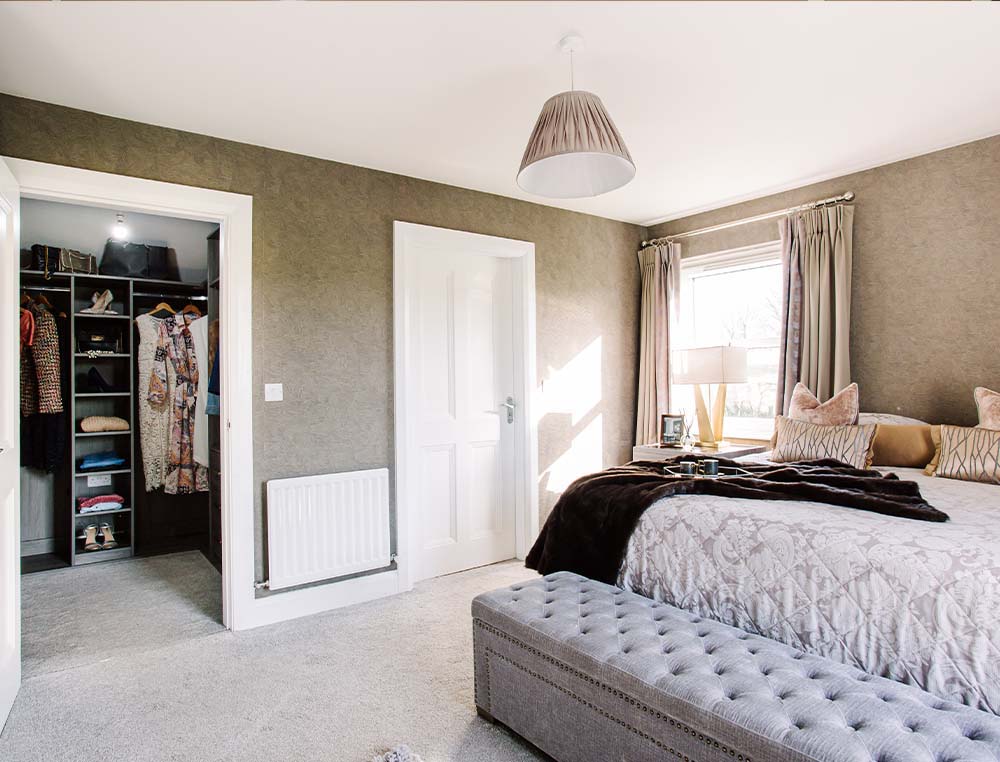 walk in wardrobe in a bedroom