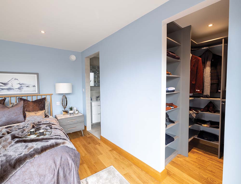 walk in wardrobe in a bedroom
