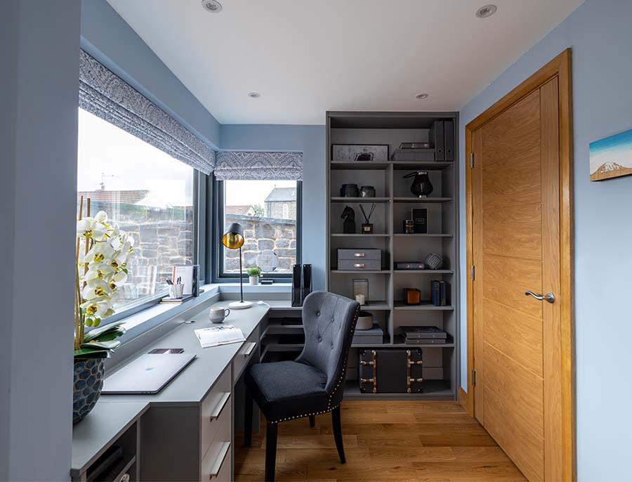 home office with desk and unit