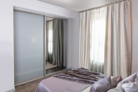 two door mirrored and grey glass wardrobe
