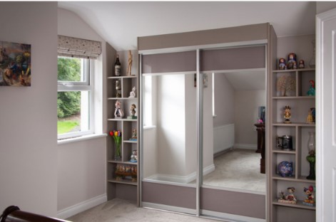 childrens room with mirror and purple panel wardrobe