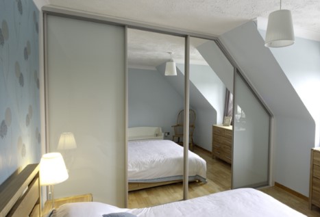 grey glass sliding angled wardrobe