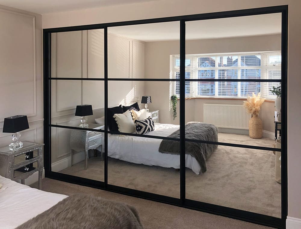 black framed mirrored sliding wardrobe