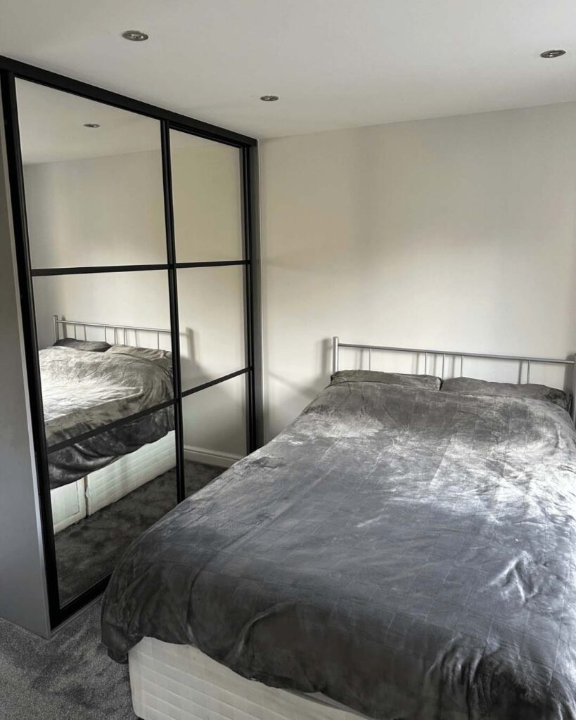 black frame mirrored wardrobe