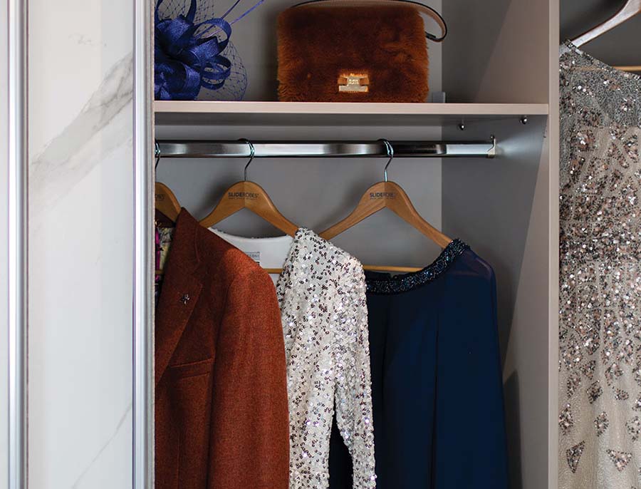 close up of hanging rail with clothes